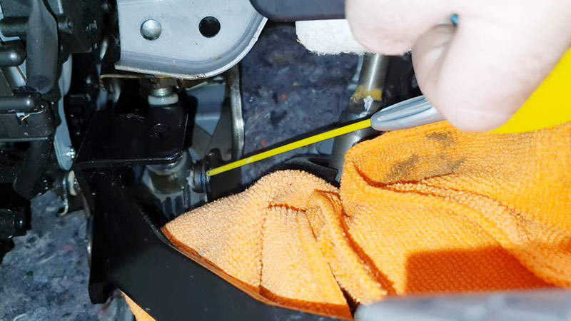 Clean Any Debris or Oil from Around the Clutch Mechanism