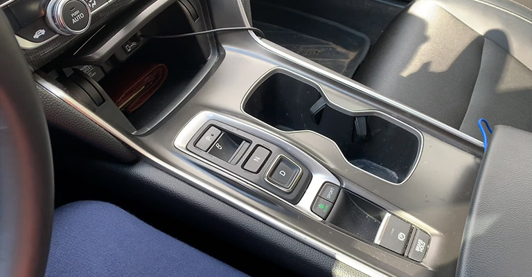 M button on their center console