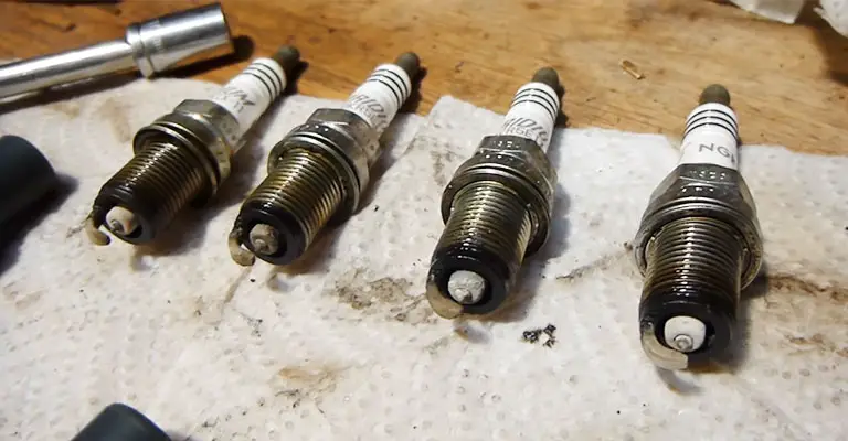 What Causes A Car To Sputter After Changing A Spark Plug