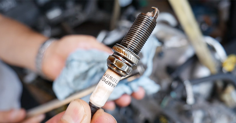 Spark Plug Fouled With Oil - Causes And Fixes